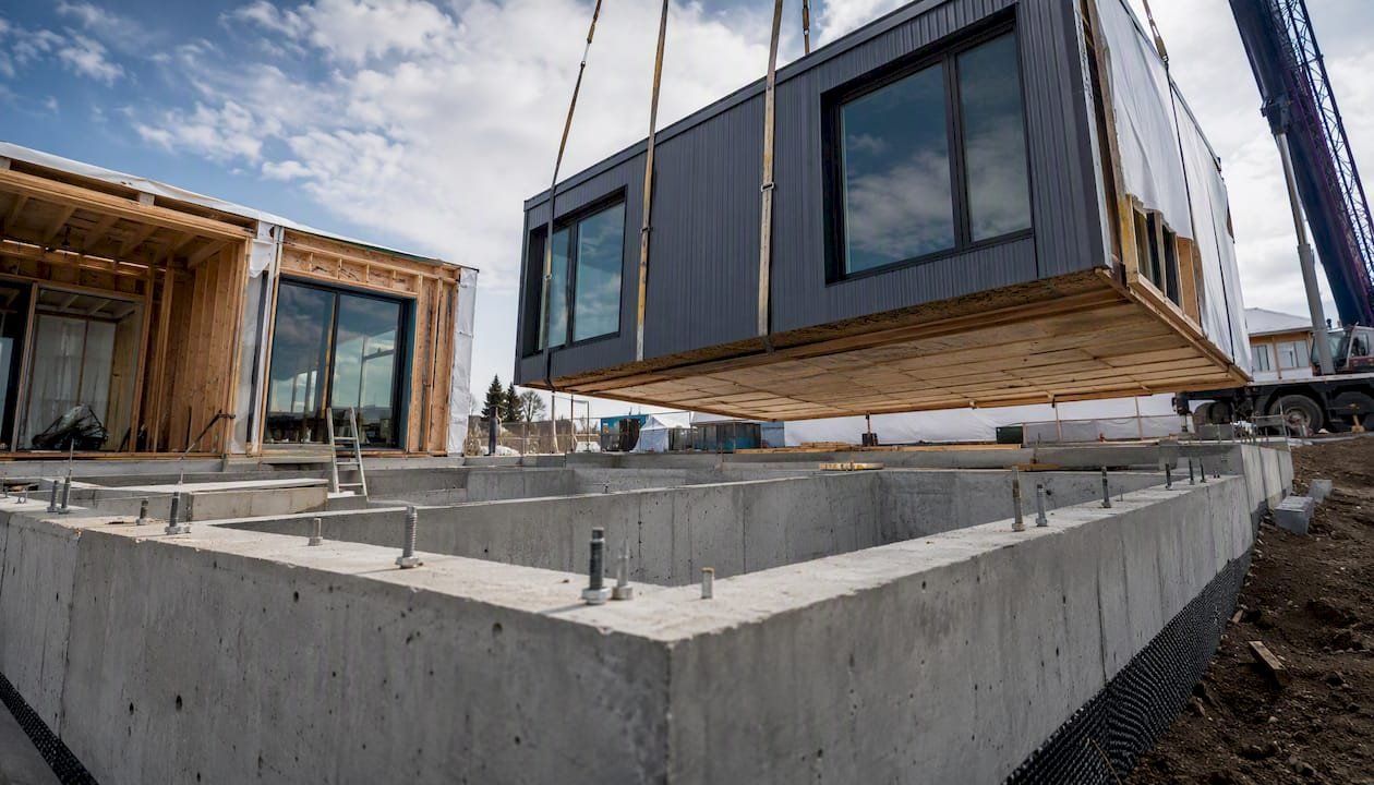 Modular home section placed on foundation